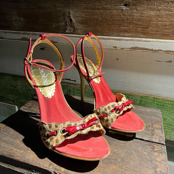 Bebe heel. Red and gold with faux leopard fur and bow. Size 6. - Picture 3 of 4